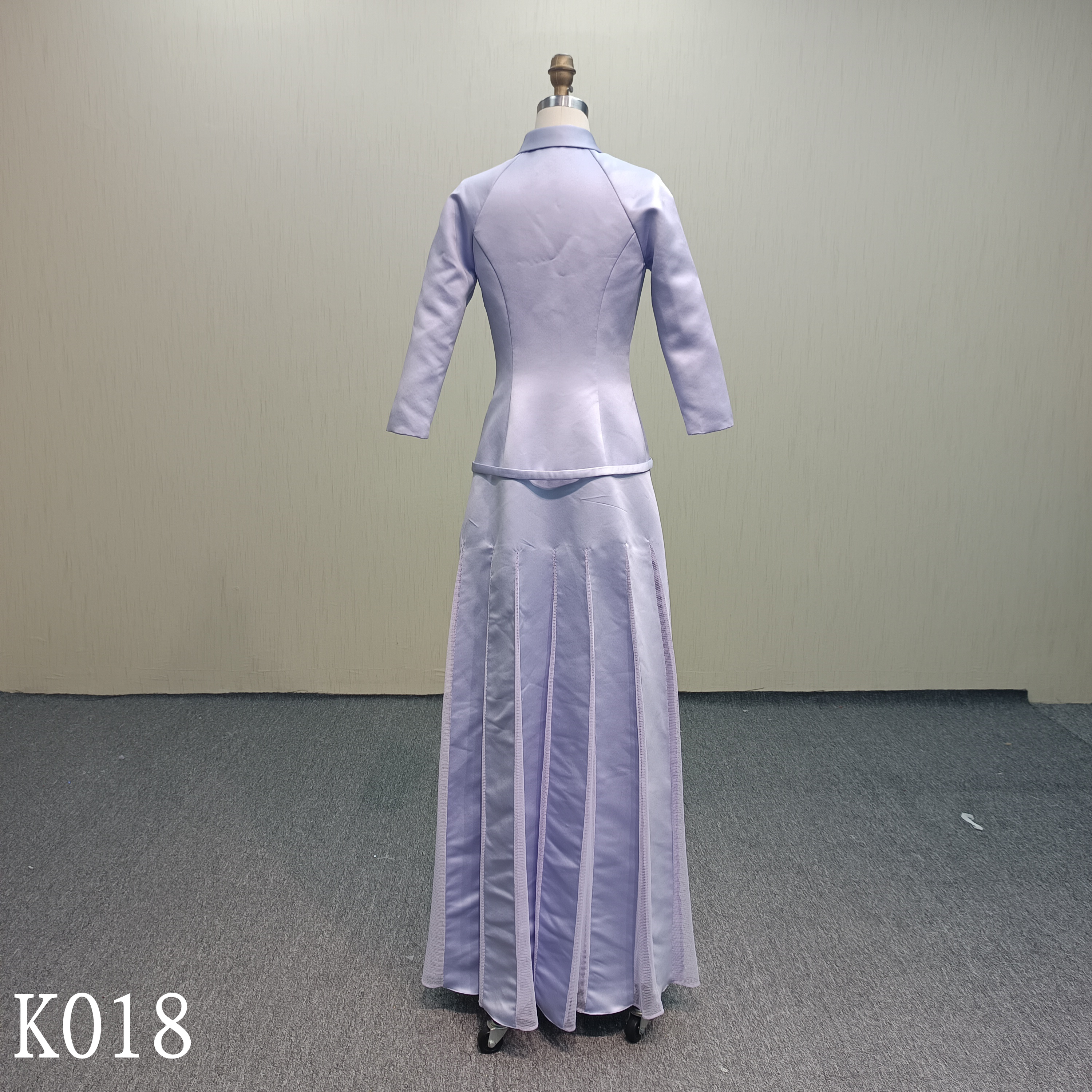 K018 A purple dress with long sleeves