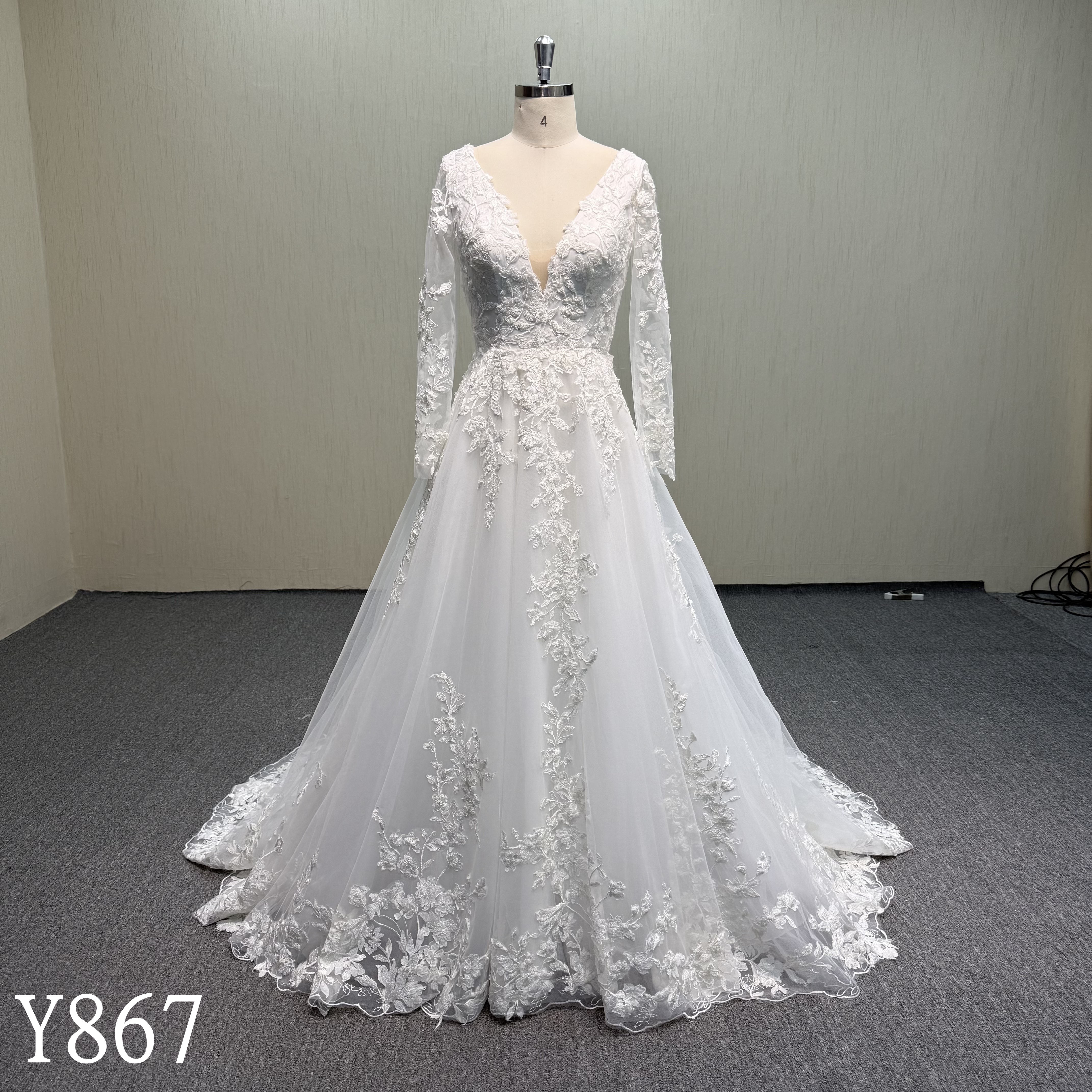 Y867  Appliqué A-Line Bridal Gown with Deep Plunge Neck and Long Sleeves
