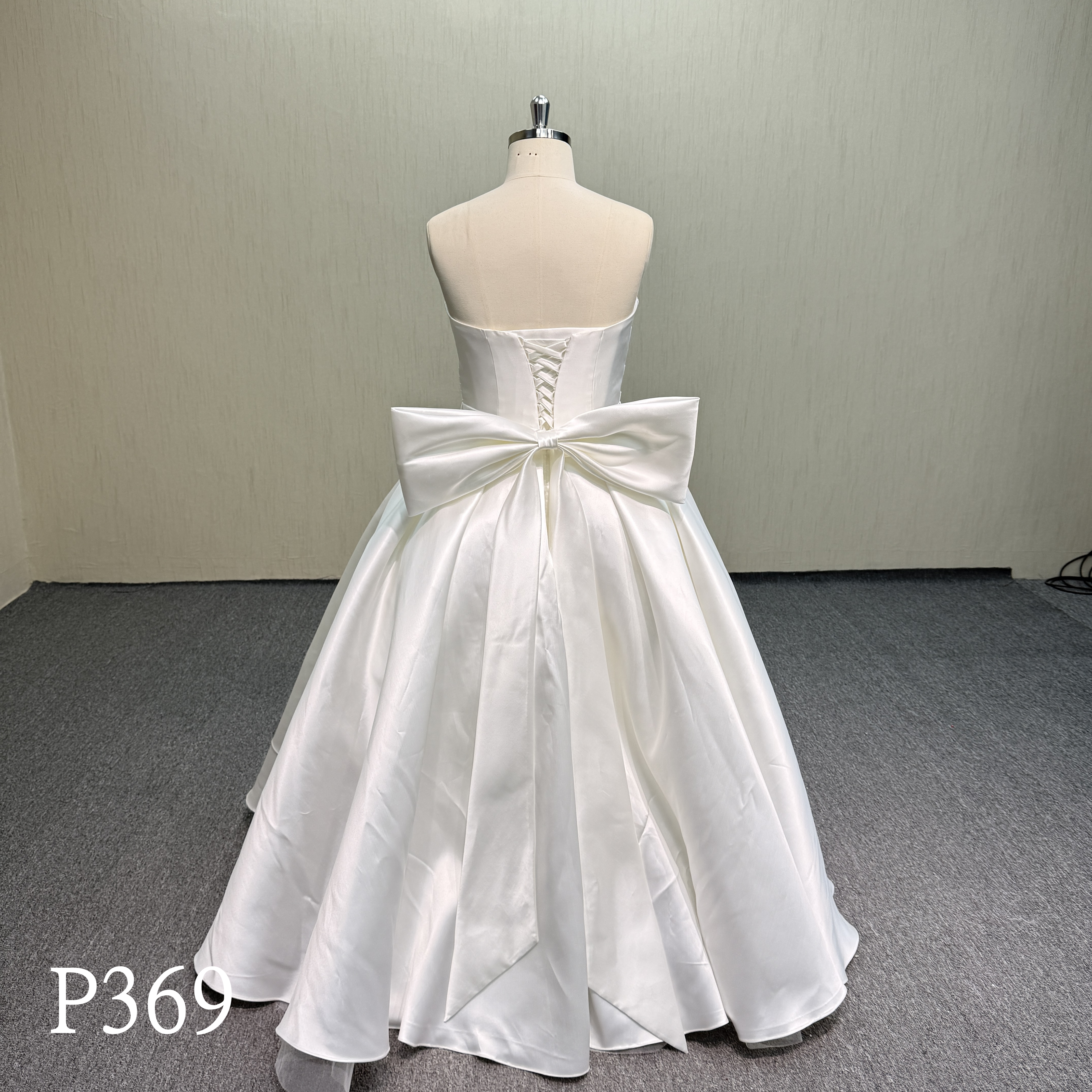 P369 Elegant Strapless A-Line Dress with Back Tie Bow.