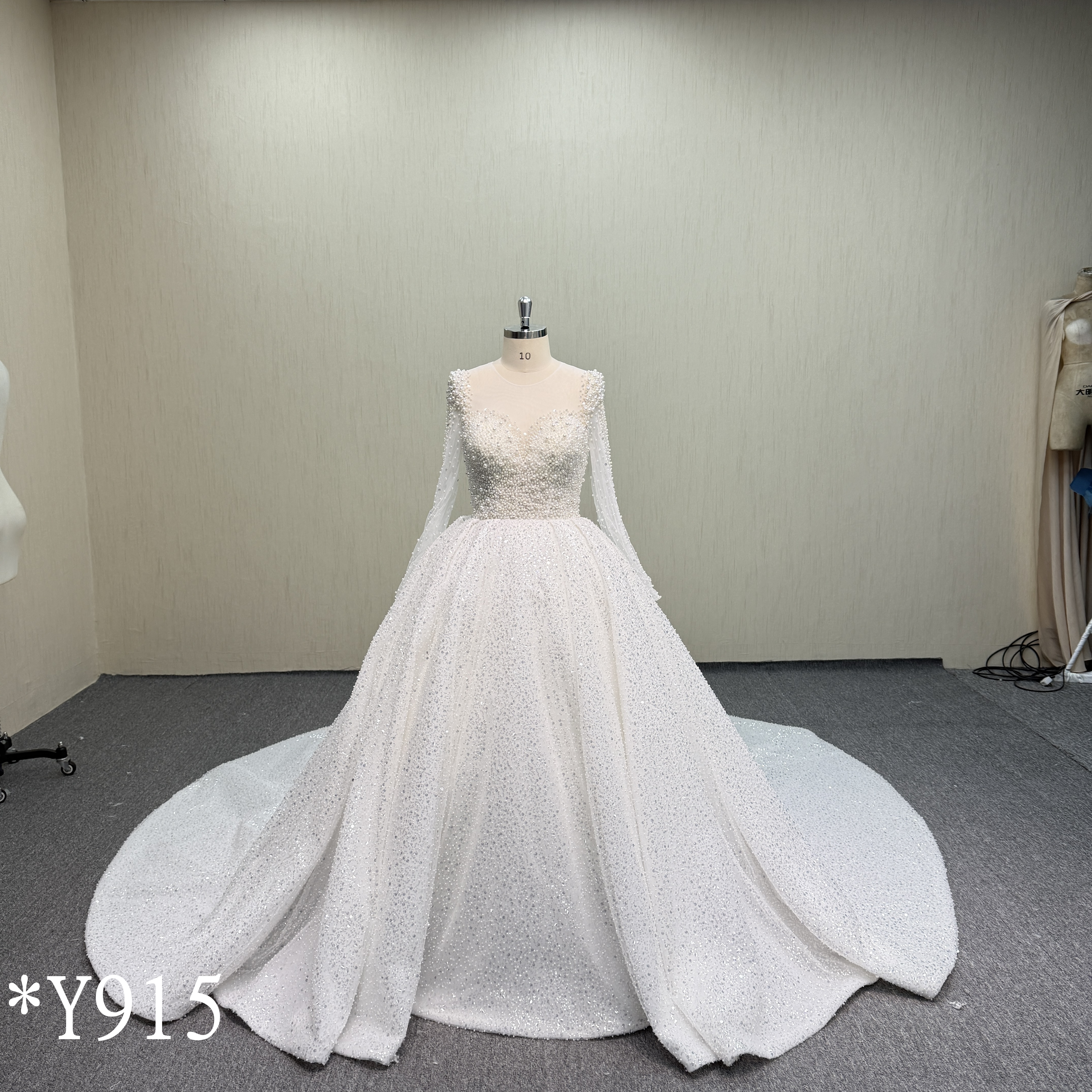 Y915 Long Sleeve Beaded Lace Ballgown with Sweep Train.