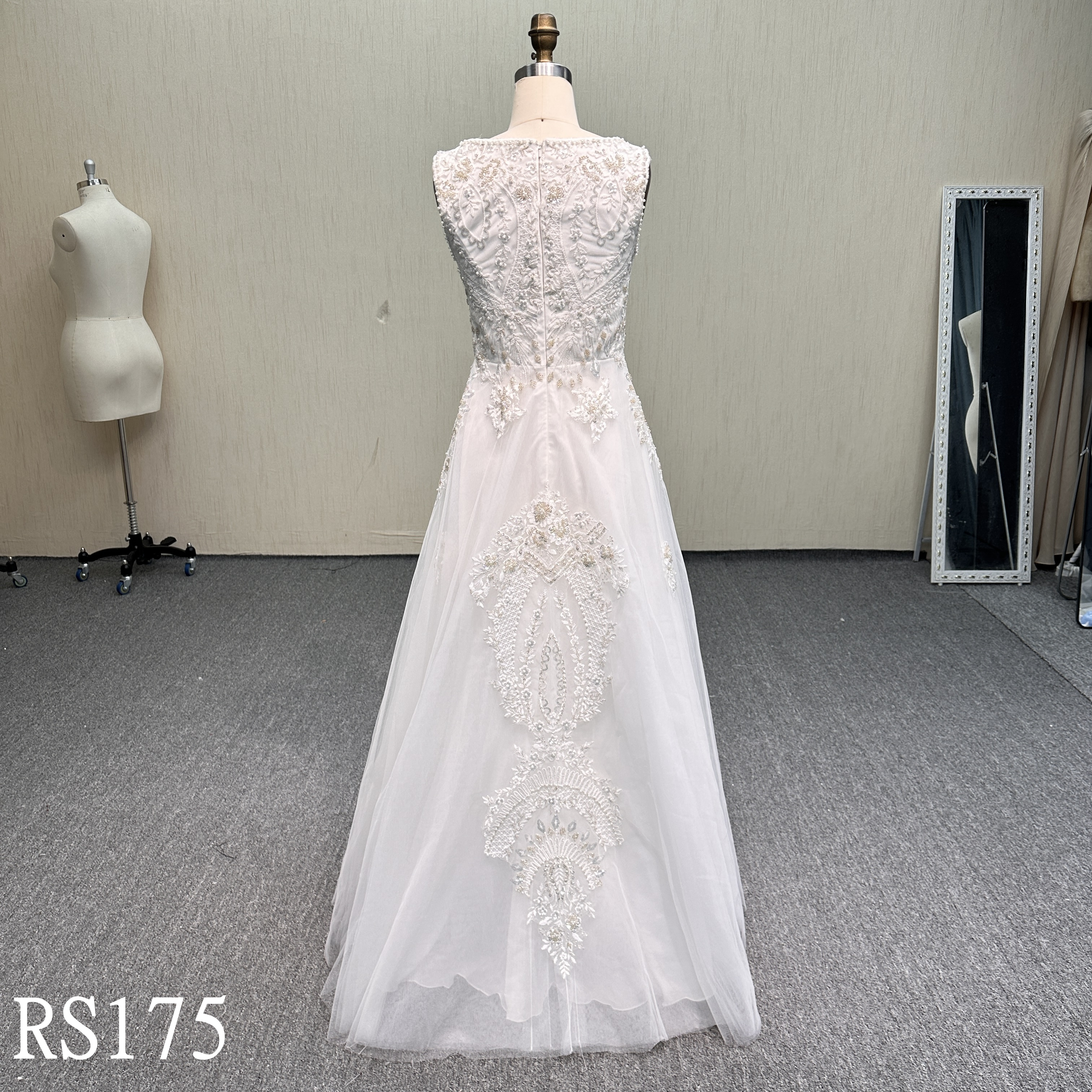 RS175 Regal Charm: Sleeveless Illusion Neck Beaded Lace Gown with Symmetrical Motifs