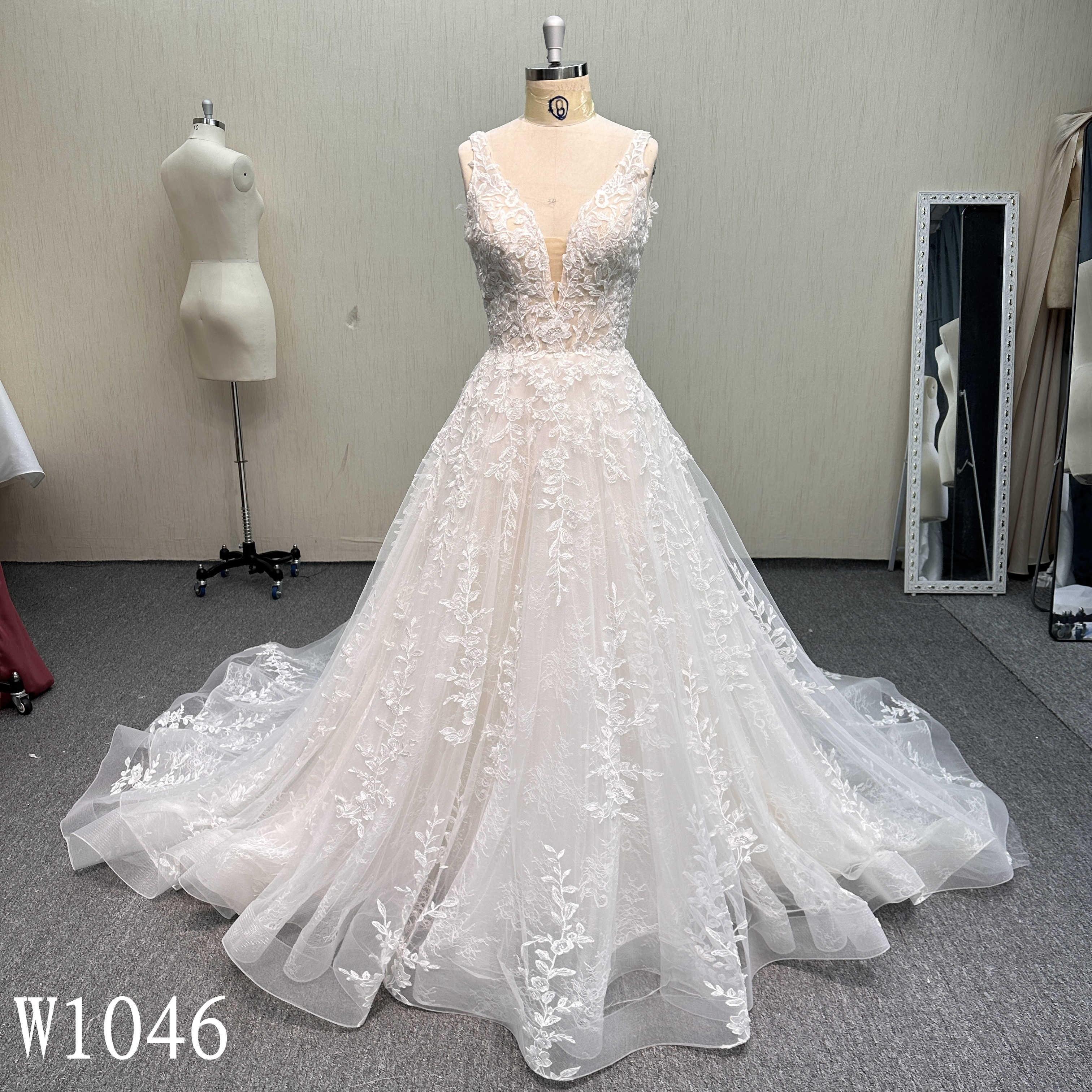 W1046 Romantic Deep V-Neck Illusion Bodice Bridal Gown.