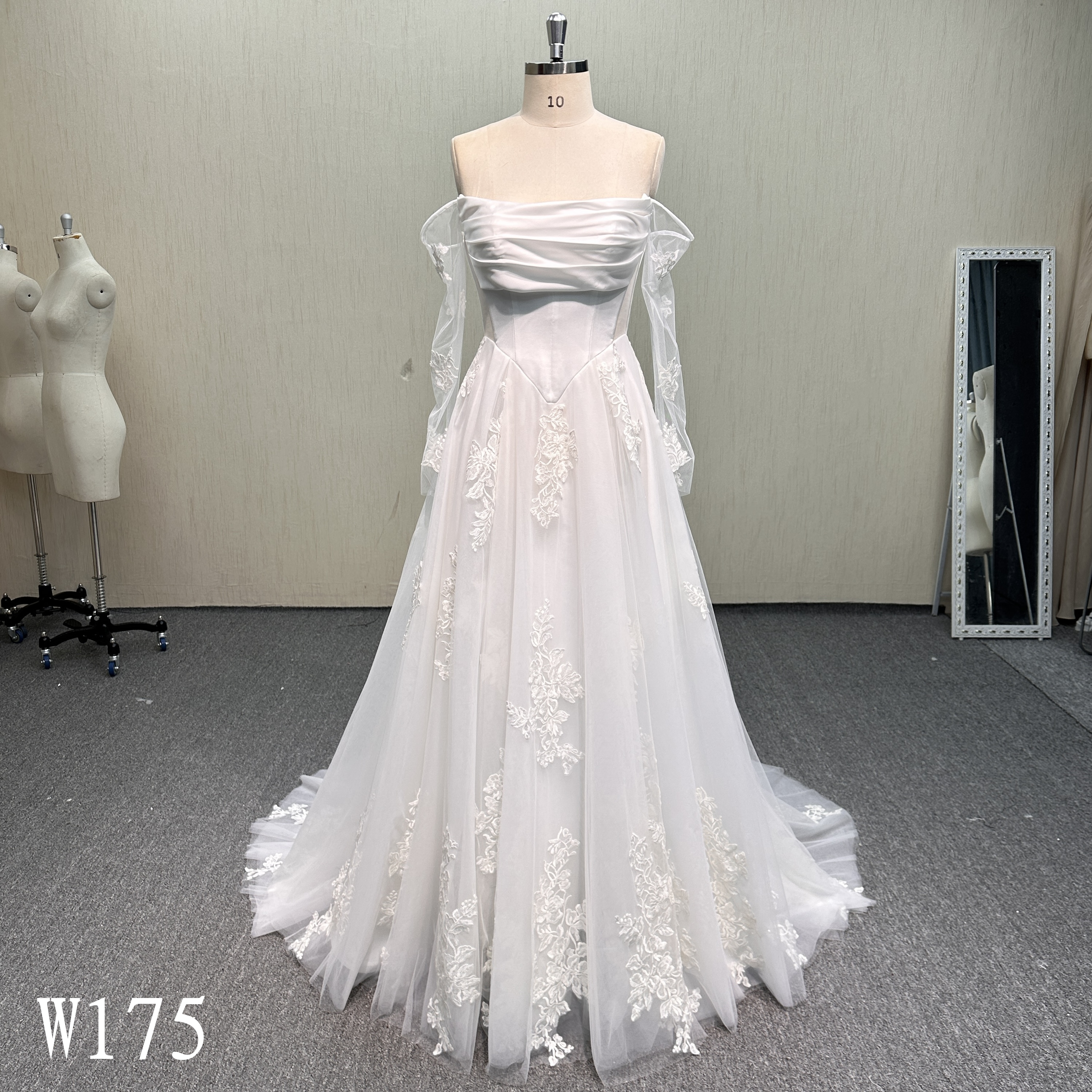W175 Off-the-Shoulder A-Line Wedding Dress with Lace Applique.