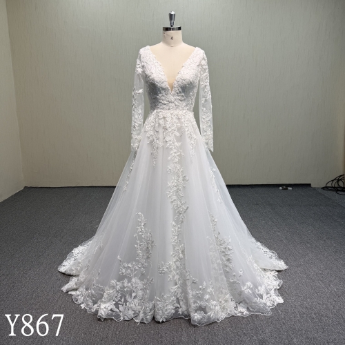 Y867  Appliqué A-Line Bridal Gown with Deep Plunge Neck and Long Sleeves