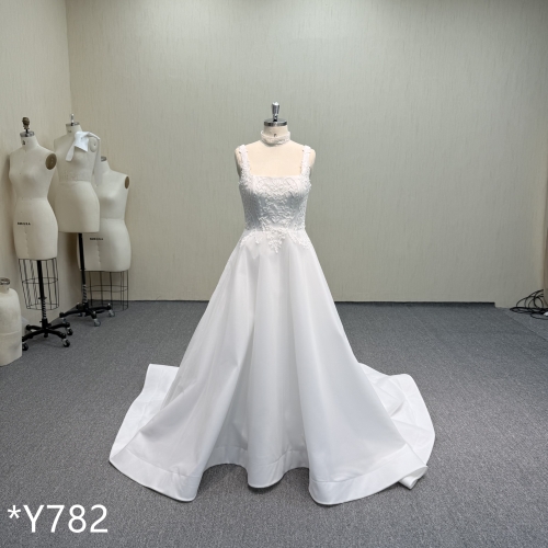 Y782 Convertible Two-Piece Wedding Gown with Detachable Lace Overlay.