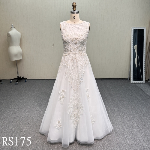 RS175 Regal Charm: Sleeveless Illusion Neck Beaded Lace Gown with Symmetrical Motifs